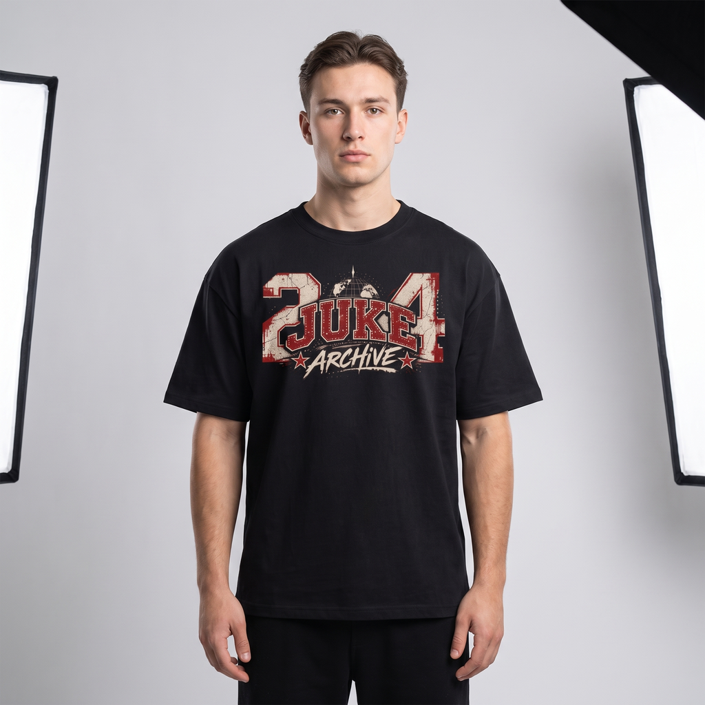 Model wearing the JUKE Unisex Oversized Drop Shoulder T-Shirt, studio shot