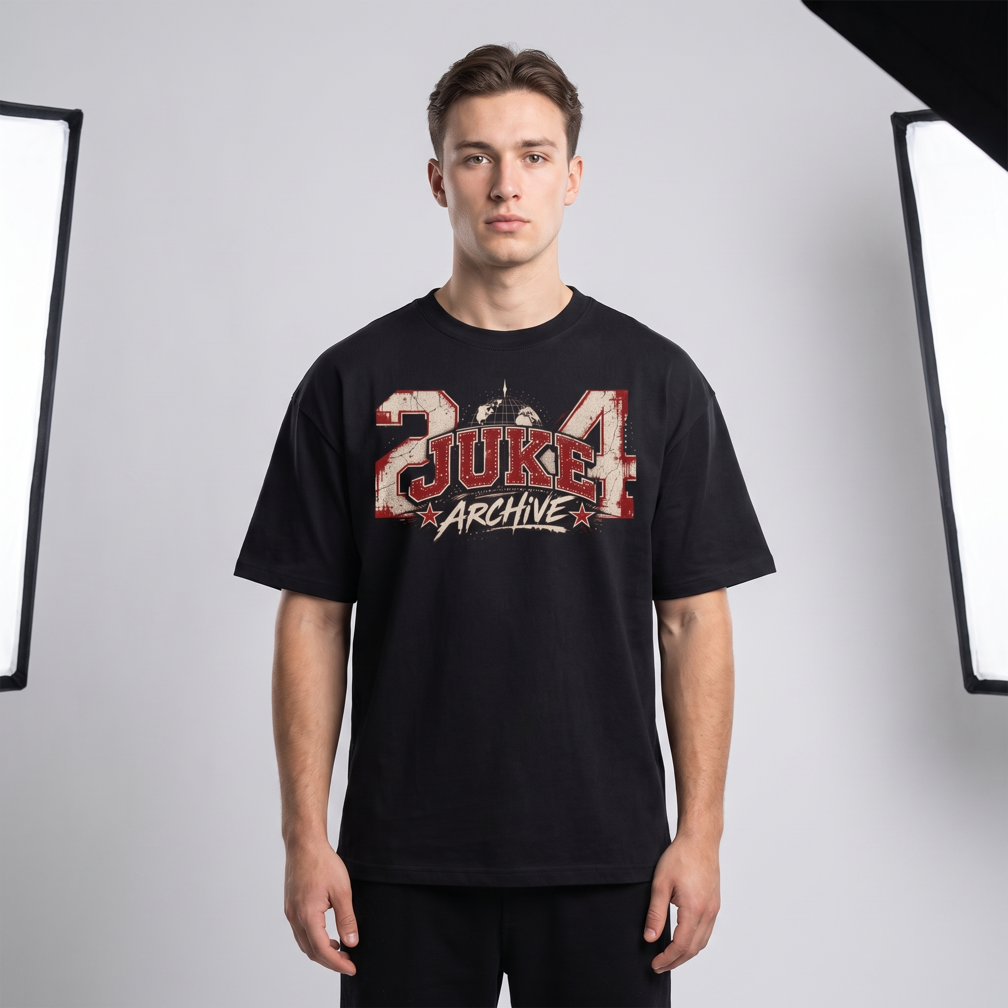 Model wearing the JUKE Unisex Oversized Drop Shoulder T-Shirt, studio shot