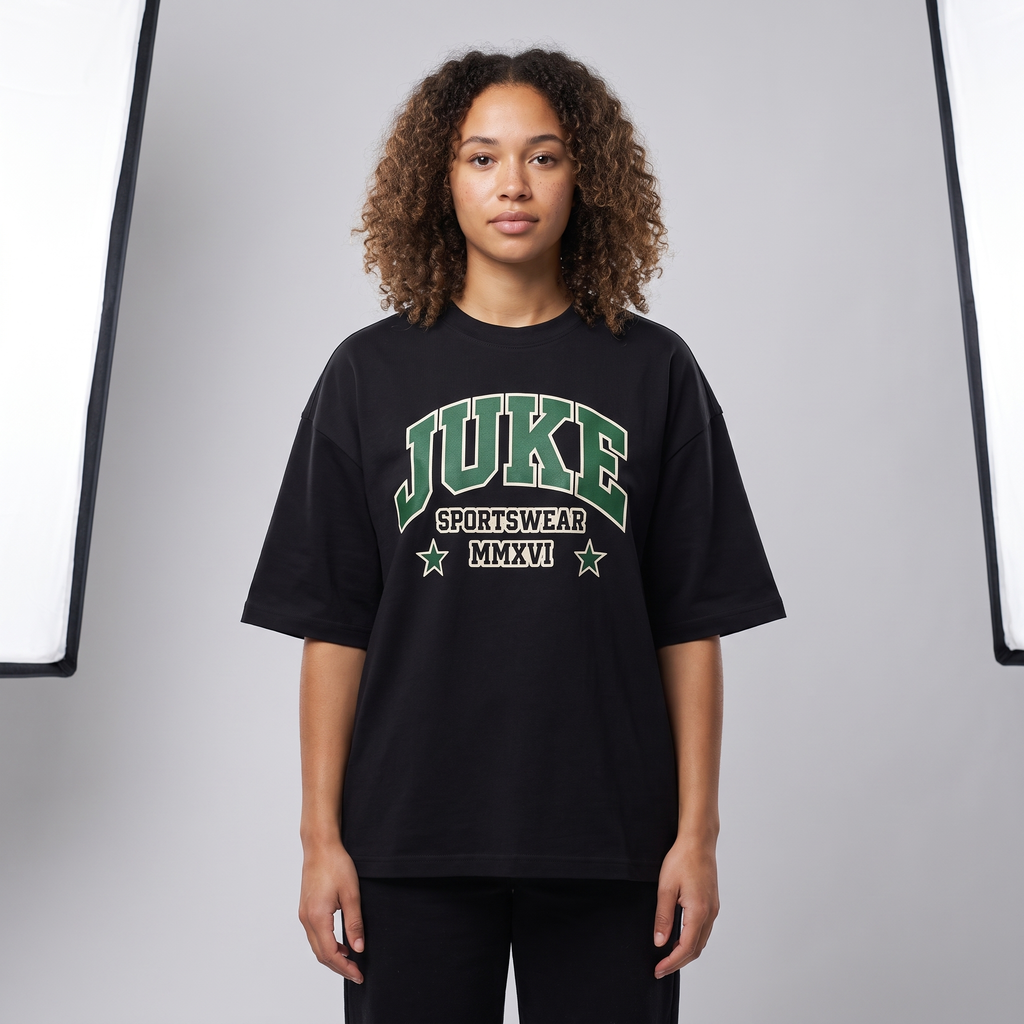 Model wearing the JUKE Unisex Boxy Oversized T-Shirt, studio shot