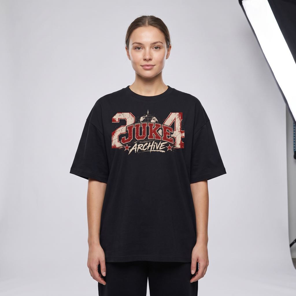 Model wearing the JUKE Unisex Oversized Drop Shoulder T-Shirt, studio shot