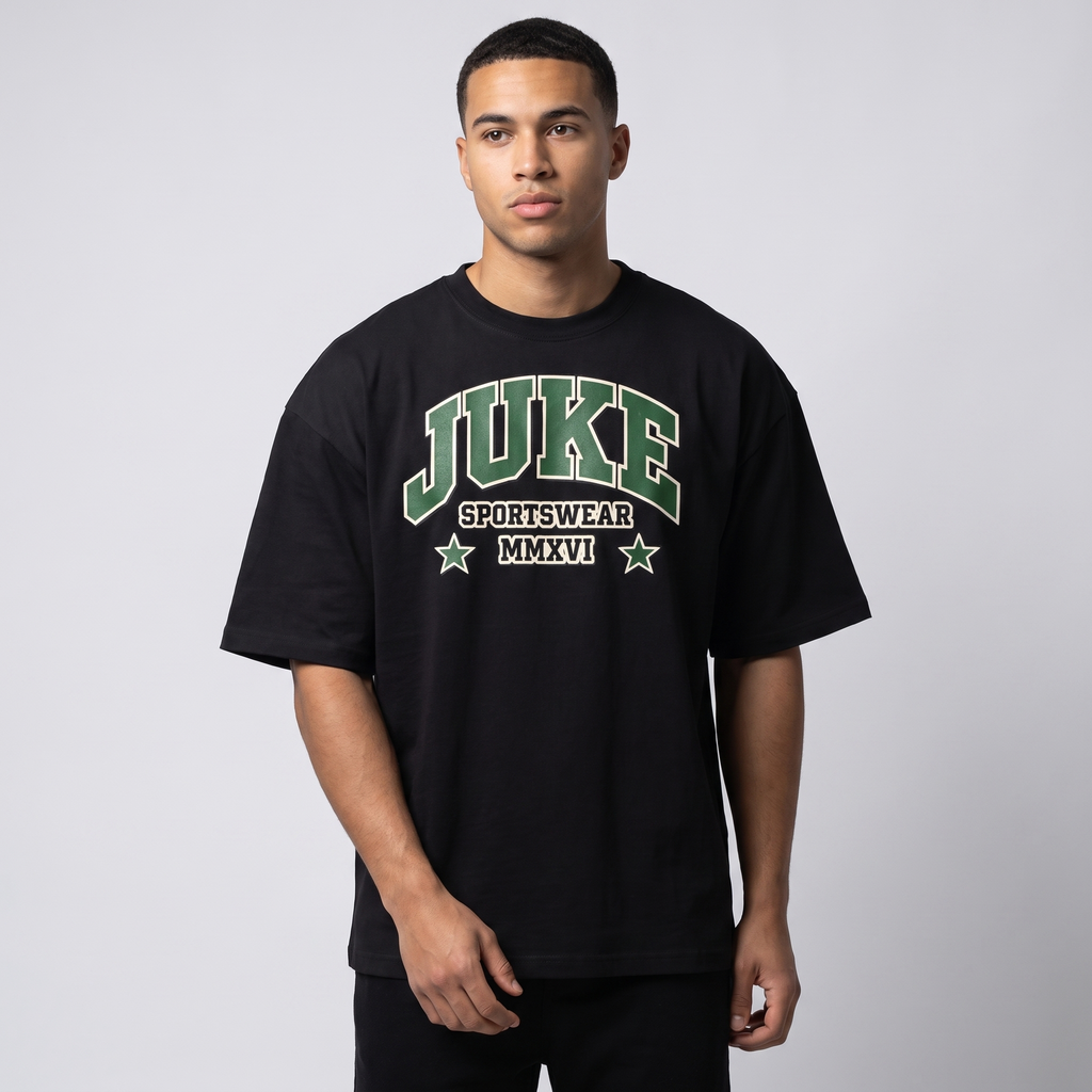 Model wearing the JUKE Unisex Boxy Oversized T-Shirt, studio shot
