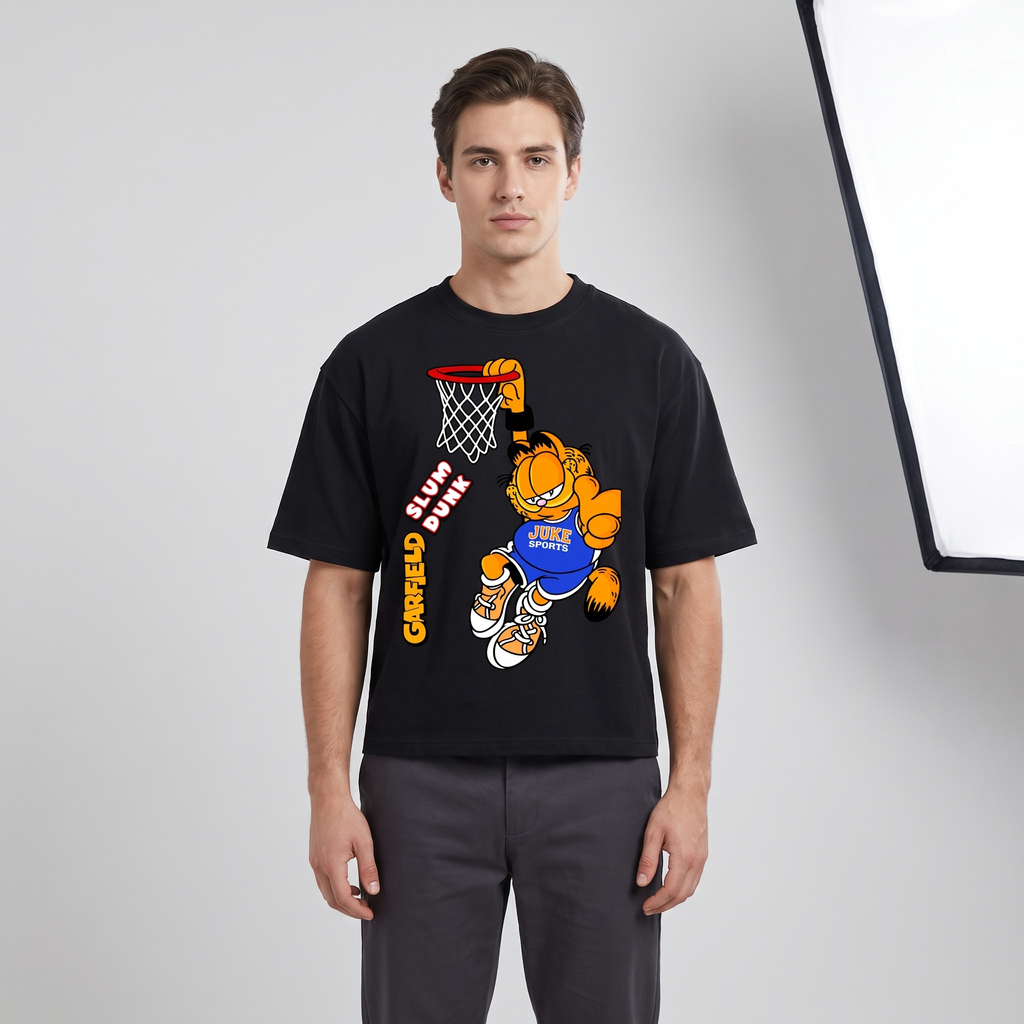 Model wearing the JUKE Unisex Heavyweight Boxy T-Shirt, studio shot
