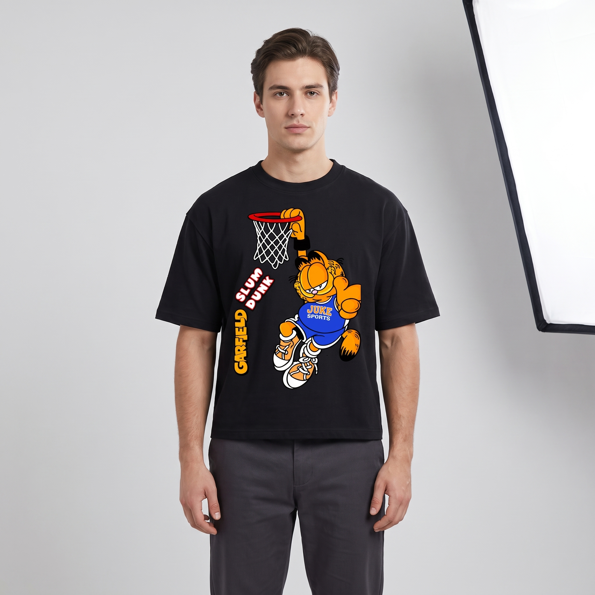 Model wearing the JUKE Unisex Heavyweight Boxy T-Shirt, studio shot